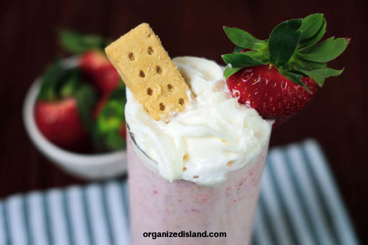 Premium Photo  Milkshake with strawberry pieces, in plastic cup, delicious  and fresh