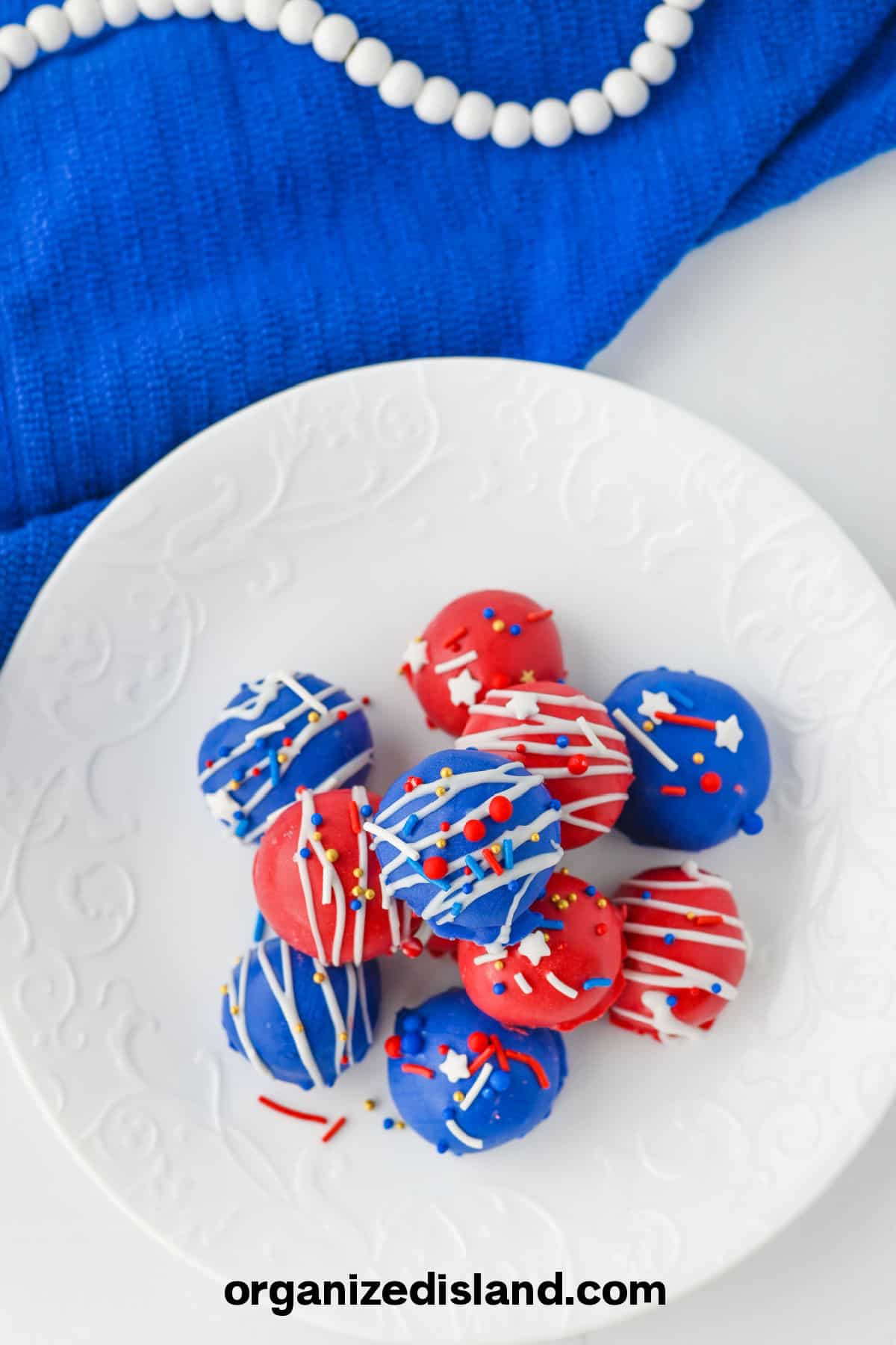 Easy Oreo Truffles Recipe\ in red white and blue on plate.