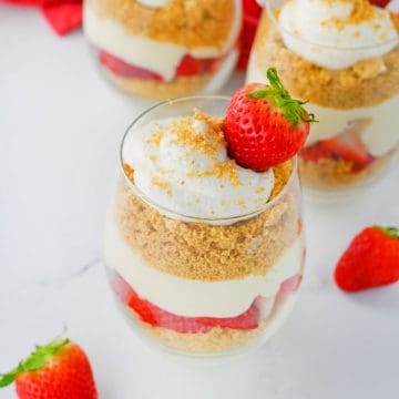 Strawberry Cheesecake Parfaits in jars.