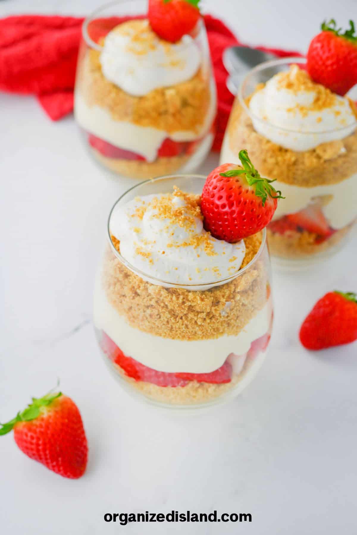 Strawberry Cheesecake Parfaits in jars.