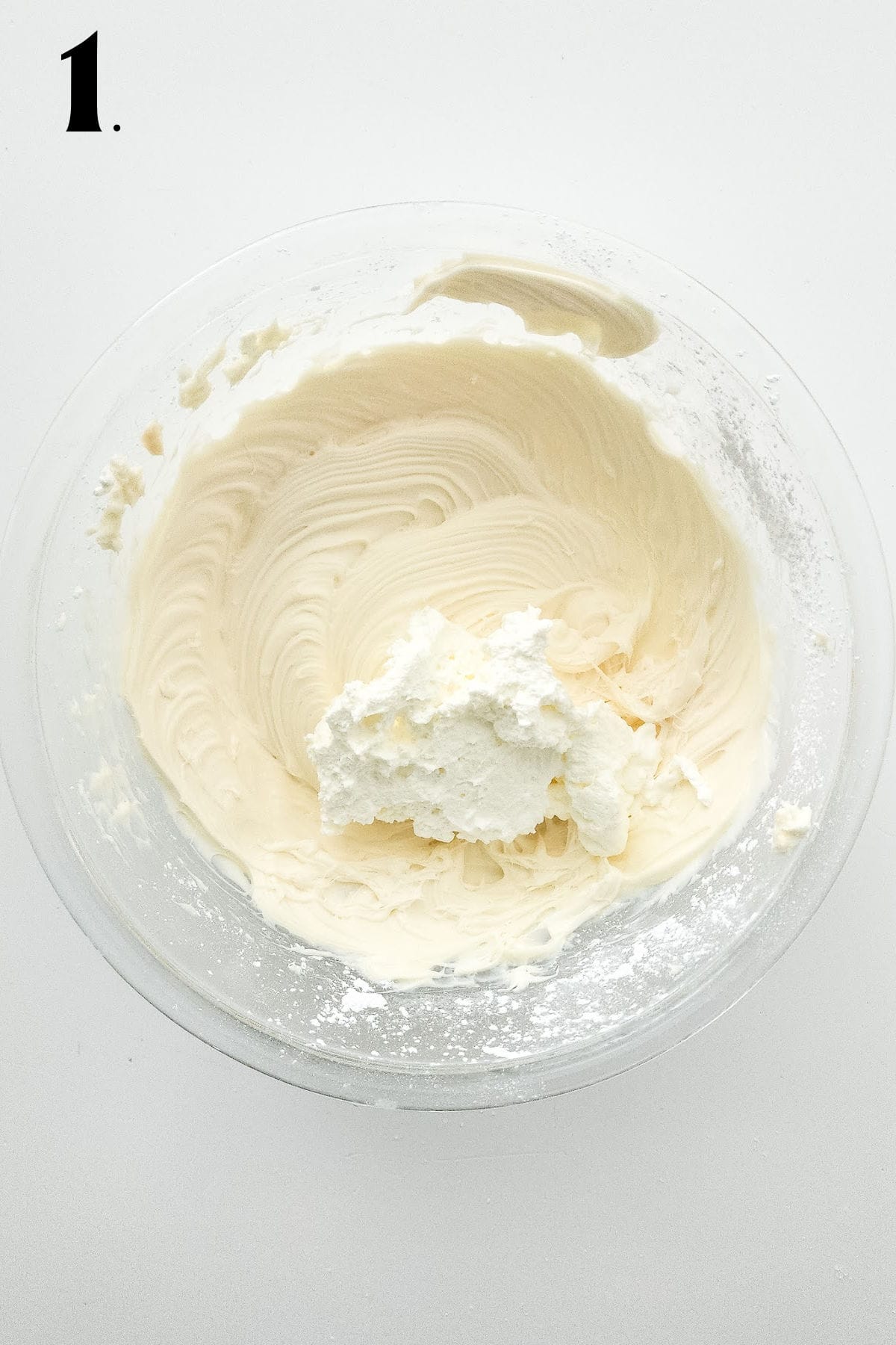 How to Make Cheesecake Mousse - Step 1 blending cream cheese mixture in bowl.