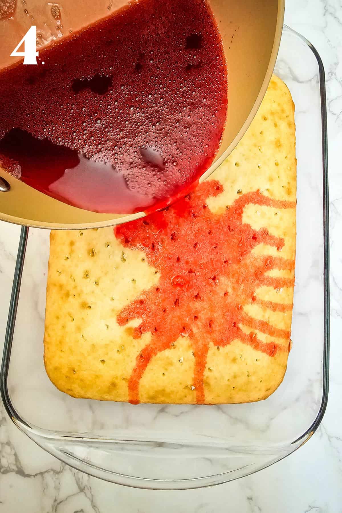 How to Make Cherry Poke Cake - Step 4 - pouring jello over cake.