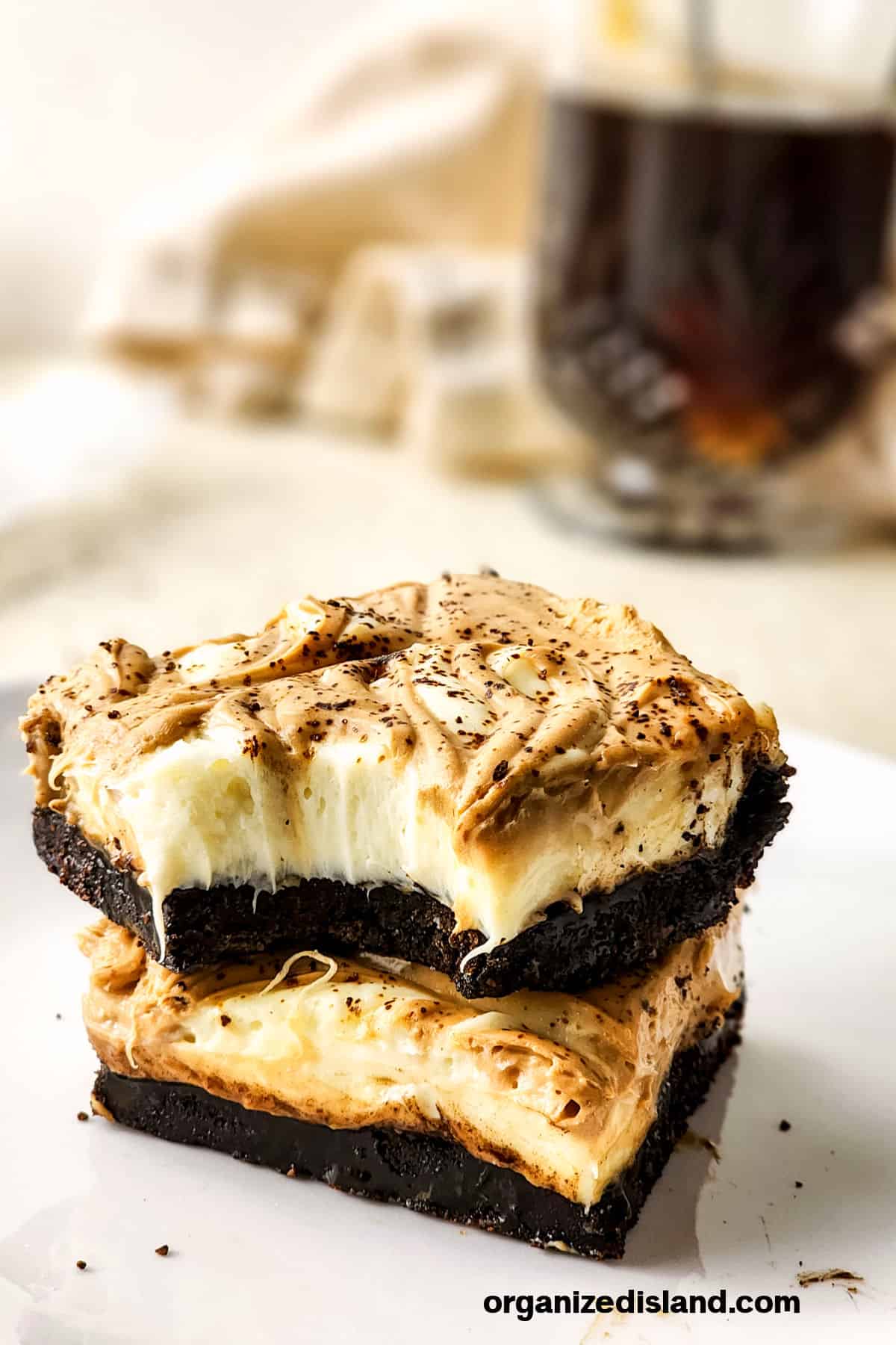 Chocolate Swirl Cheesecake cut into bars.